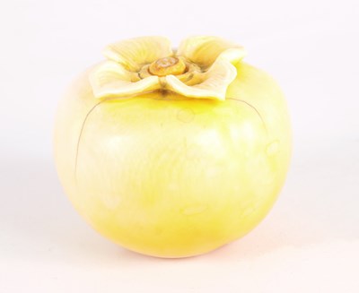 Lot 57 - A LATE 19TH CENTURY STAINED CARVED IVORY PERSIMMON FRUIT