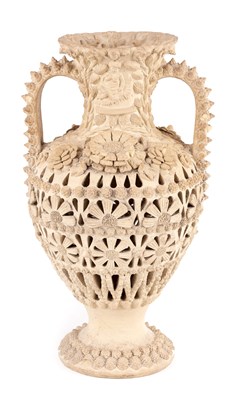 Lot 46 - A LATE 19TH CENTURY SPANISH PIERCED EARTHENWARE DOUBLE HANDLED VASE
