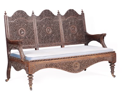 Lot 154 - A 19TH CENTURY ANGLO-INDIAN HARDWOOD THREE-SEATER SETTEE