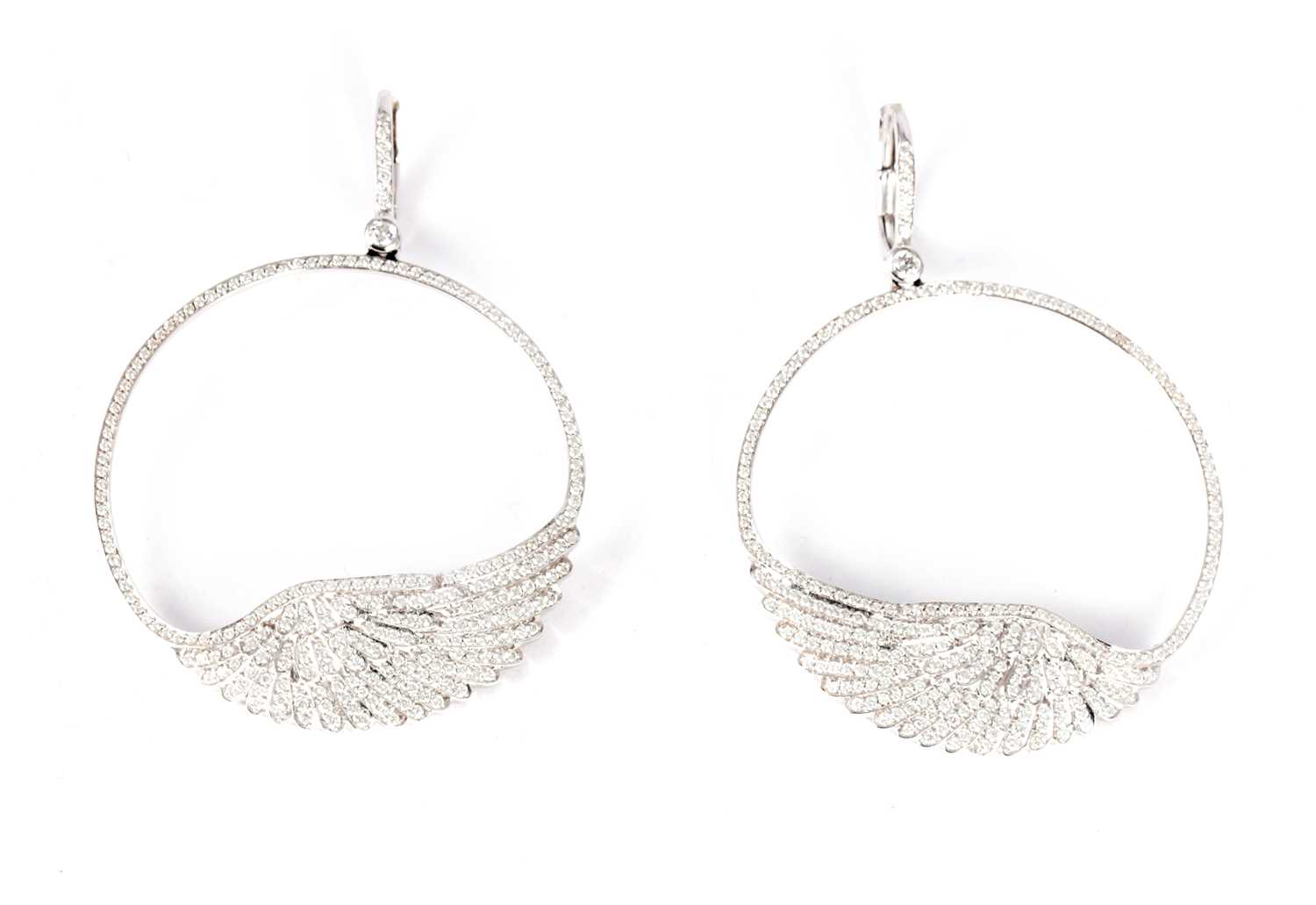 Lot 233 - A PAIR OF AUSTRIAN GARRARD DIAMOND ENCRUSTED 18CT WHITE GOLD ANGEL WING EARRINGS
