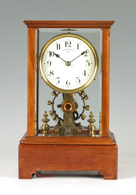 Lot 891 - EUREKA CLOCK CO. LTD. LONDON  AN EARLY 20th CENTURY ENGLISH MAHOGANY FIVE GLASS ELECTRIC MANTEL CLOCK