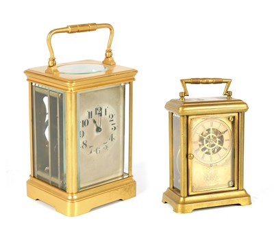 Lot 492 - TWO LATE 19TH CENTURY AMERICAN BRASS STRIKING CARRIAGE CLOCKS