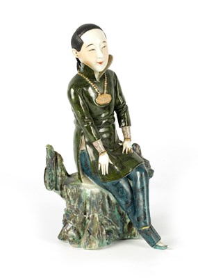 Lot 71 - A CHINESE REPUBLIC POLYCHROME PORCELAIN FIGURE