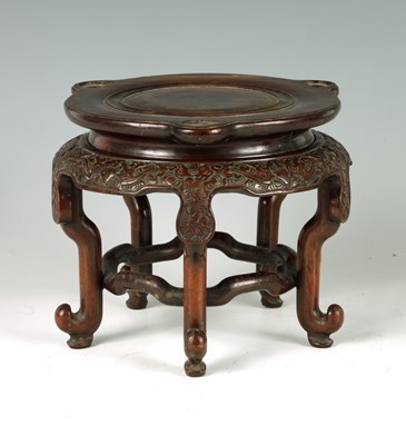 Lot 201 - A 19TH CENTURY CHINESE HARDWOOD JARDINIERE STAND