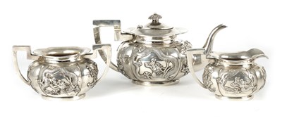 Lot 206 - AN EARLY 20TH CENTURY CHINESE SILVER THREE PIECE TEA SERVICE