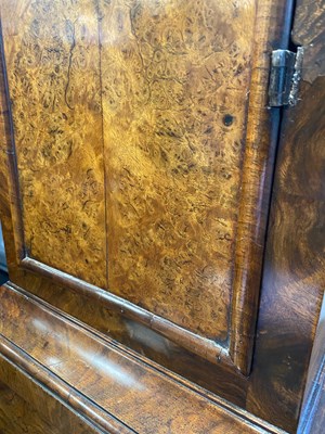 Lot 953 - JOSEPH WINDMILLS, LONDON AN EARLY 18TH CENTURY 11” BRASS DIAL BURR WALNUT LONGCASE CLOCK