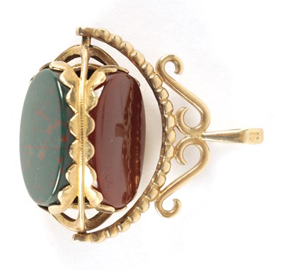 Lot 236 - A 9CT GOLD AND HARDSTONE SWIVEL MOUNTED WATCH FOB