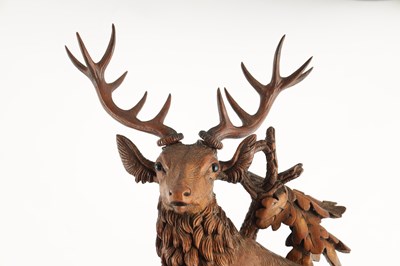 Lot 794 - A LARGE LATE 19TH CENTURY CARVED BLACK FOREST MANTEL CLOCK