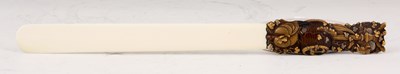 Lot 87 - A 19TH CENTURY BRONZE AND IVORY JAPANESE PAPER...