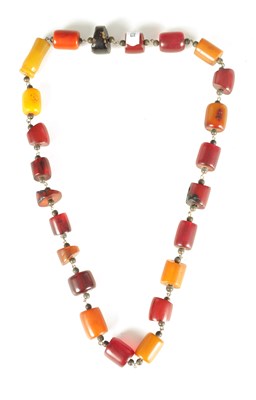 Lot 244 - AN AMBER BEAD NECKLACE