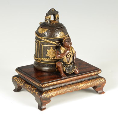 Lot 202 - A MEIJI PERIOD JAPANESE MIYAO BRONZE AND GILT ENGRAVED INKSTAND