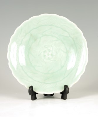 Lot 147 - A CHINESE CELADON GLAZE SHALLOW DISH