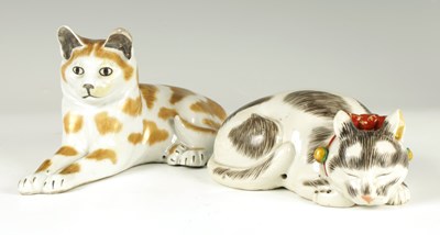 Lot 34 - TWO CONTINENTAL PORCELAIN  RECUMBENT CATS
