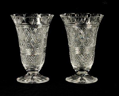 Lot 13 - A GOOD PAIR OF WATERFORD CUT CRYSTAL TRUMPET-SHAPED FOOTED VASES