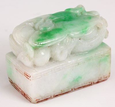 Lot 110 - A CHINESE APPLE GREEN JADE SEAL of rectangular...