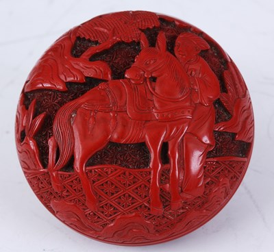 Lot 125 - A 19TH CENTURY CINNABAR CIRCULAR FINELY CARVED...