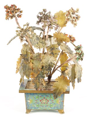 Lot 134 - A CHINESE HARDSTONE TREE IN CLOISONNE JARDINIERE