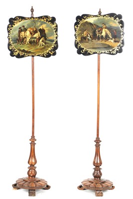 Lot 749 - A PAIR OF 19TH CENTURY ROSEWOOD POLE SCREENS WITH LACQUERED PAPIER MACHE POLE SCREENS AFTER EDWIN LANDSEER