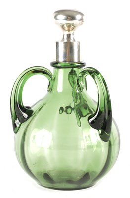 Lot 4 - A LATE 19TH CENTURY SILVER MOUNTED GREEN GLASS THREE HANDLED CARAFE