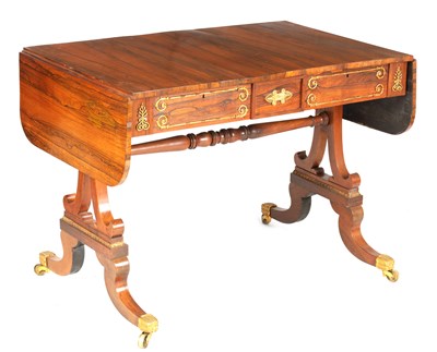 Lot 1157 - A REGENCY BRASS MOUNTED FIGURED ROSEWOOD SOFA TABLE
