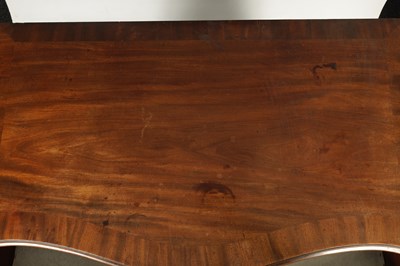 Lot 777 - A GEORGE III MAHOGANY SERPENTINE CHEST