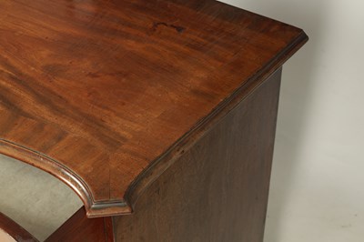 Lot 777 - A GEORGE III MAHOGANY SERPENTINE CHEST