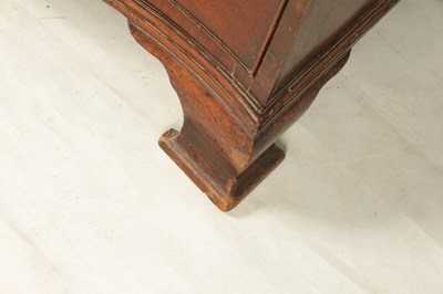 Lot 777 - A GEORGE III MAHOGANY SERPENTINE CHEST