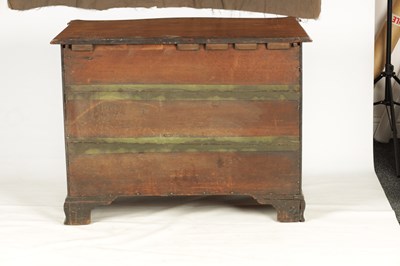 Lot 777 - A GEORGE III MAHOGANY SERPENTINE CHEST