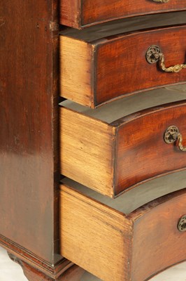 Lot 777 - A GEORGE III MAHOGANY SERPENTINE CHEST