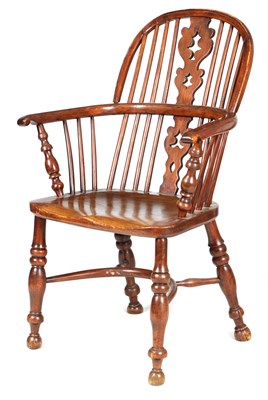 Lot 1177 - A 19TH CENTURY NOTTINGHAMSHIRE YEW WOOD LOW BACK WINDSOR ARMCHAIR