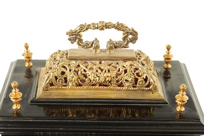 Lot 60 - JONATHAN LOWNDES IN YE PALL MALL, (LONDON).  A WILLIAM AND MARY EBONY VENEERED GILT BRASS MOUNTED BASKET TOP BRACKET CLOCK CIRCA 1685