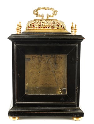 Lot 60 - JONATHAN LOWNDES IN YE PALL MALL, (LONDON).  A WILLIAM AND MARY EBONY VENEERED GILT BRASS MOUNTED BASKET TOP BRACKET CLOCK CIRCA 1685