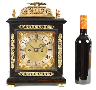 Lot 60 - JONATHAN LOWNDES IN YE PALL MALL, (LONDON).  A WILLIAM AND MARY EBONY VENEERED GILT BRASS MOUNTED BASKET TOP BRACKET CLOCK CIRCA 1685