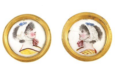Lot 189 - A PAIR OF GEORGE III CIRCULAR CONVEX ENAMEL PORTRAIT MEDALLIONS