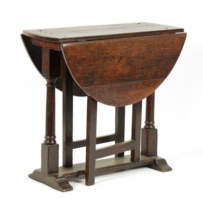Lot 707 - A 17TH CENTURY JOINED OAK GATELEG TABLE OF SMALL SIZE