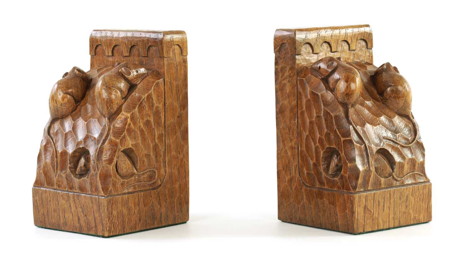 Lot 657 - AN UNUSUAL PAIR OF ROBERT ‘MOUSEMAN’ THOMPSON TRIPLE MICE ADZED OAK BOOK ENDS
