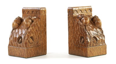 Lot 657 - AN UNUSUAL PAIR OF ROBERT ‘MOUSEMAN’ THOMPSON TRIPLE MICE ADZED OAK BOOK ENDS