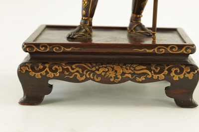 Lot 145 - A FINE QUALITY JAPANESE MEIJI PERIOD PATINATED BRONZE AND GILT SCULPTURE OF A SAMURAI WARRIOR BY MIYAO