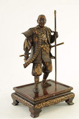 Lot 145 - A FINE QUALITY JAPANESE MEIJI PERIOD PATINATED BRONZE AND GILT SCULPTURE OF A SAMURAI WARRIOR BY MIYAO