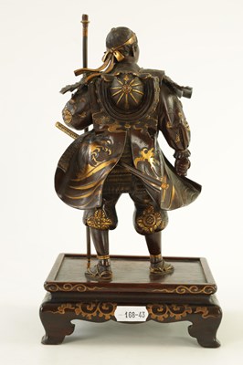 Lot 145 - A FINE QUALITY JAPANESE MEIJI PERIOD PATINATED BRONZE AND GILT SCULPTURE OF A SAMURAI WARRIOR BY MIYAO