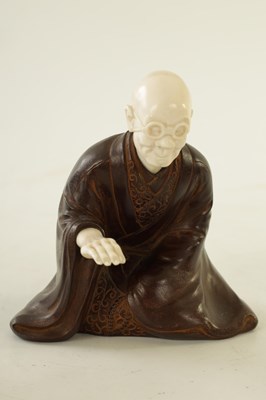 Lot 152 - A JAPANESE MEIJI PERIOD BRONZE AND IVORY FIGURAL GROUP OF THREE ELDERS PLAYING GO & GO BANG GAME
