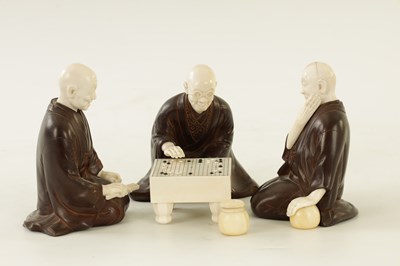 Lot 152 - A JAPANESE MEIJI PERIOD BRONZE AND IVORY FIGURAL GROUP OF THREE ELDERS PLAYING GO & GO BANG GAME