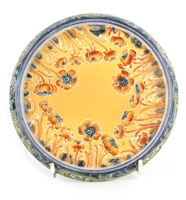Lot 62 - A JAMES MACINTYRE AND CO BURSLEM CIRCULAR TEAPOT STAND