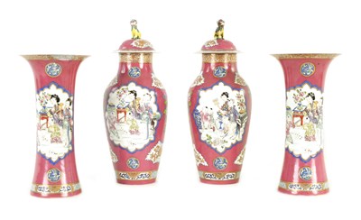 Lot 43 - A 19TH CENTURY PORCELAIN FAMILLE ROSE GARNITURE SET