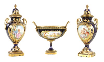 Lot 39 - A GOOD 20TH CENTURY PARIS PORCELAIN AND ORMOLU MOUNTED THREE PIECE CLOCK GARNITURE SET