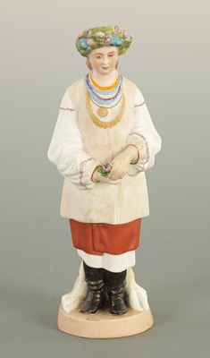 Lot 24 - AN EARLY 20TH CENTURY RUSSIAN STANDING BISQUE FIGURE OF A FLOWER GIRL