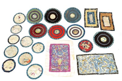 Lot 104 - A COLLECTION OF 19 CHINESE COLOURFUL SILK EMBROIDERED CIRCULAR AND OTHER PANELS