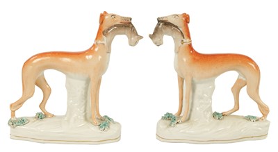 Lot 159 - A PAIR OF  19TH CENTURY STAFFORDSHIRE GREYHOUNDS