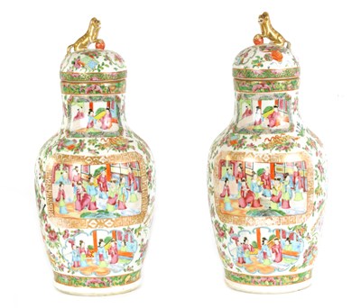 Lot 61 - A PAIR OF 19TH CENTURY CANTON OVOID VASES WITH DOME COVERS AND DOG O FOE FINIALS