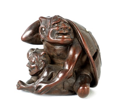 Lot 8 - A JAPANESE MEIJI PERIOD CARVED BOXWOOD NETSUKE